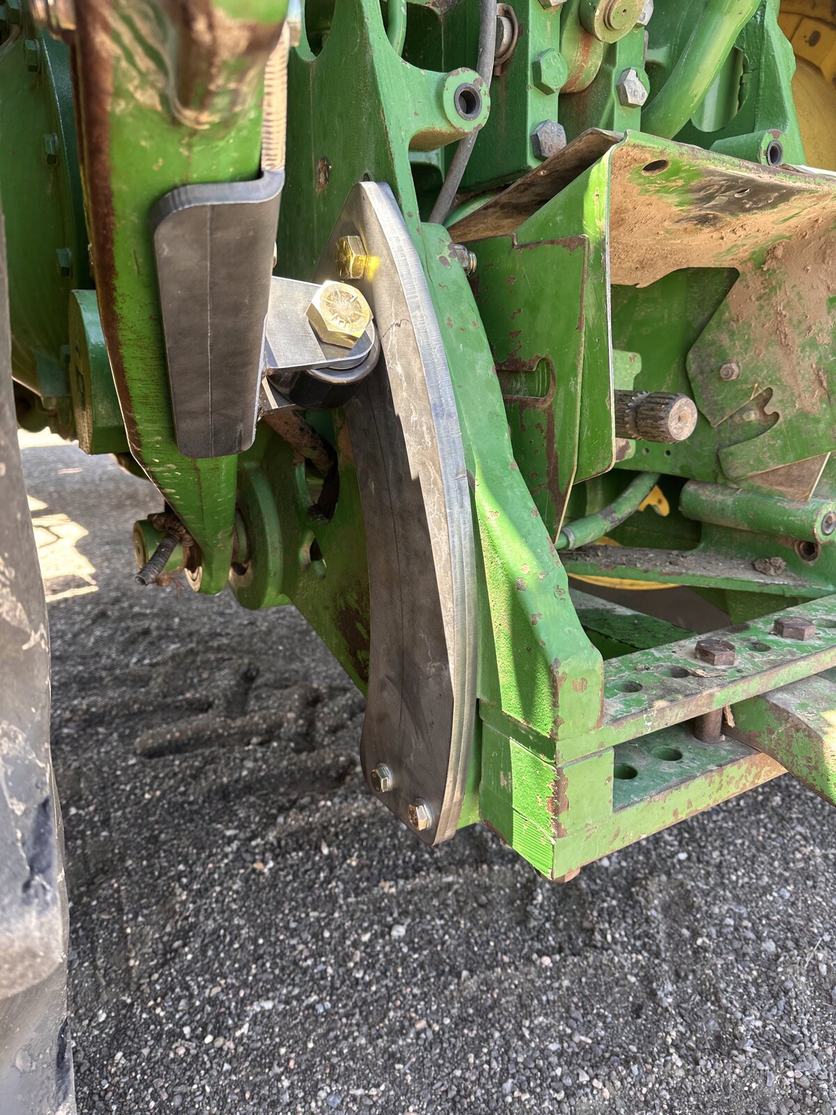 RollerGlide Heritage curved wear plate &mdash; raw steel before powder coating, John Deere 8000 Series