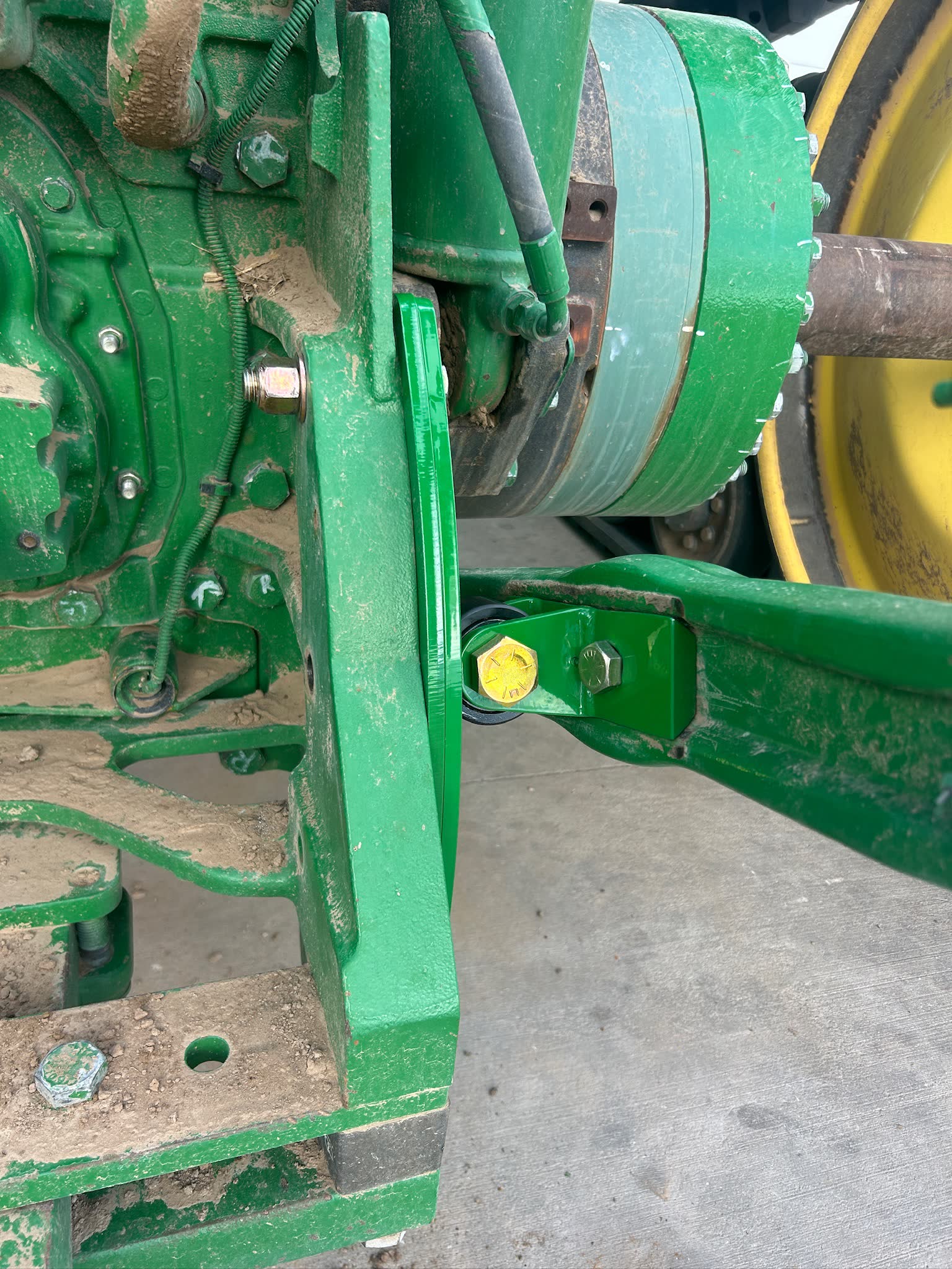 RollerGlide bearing bracket installed on John Deere three-point hitch